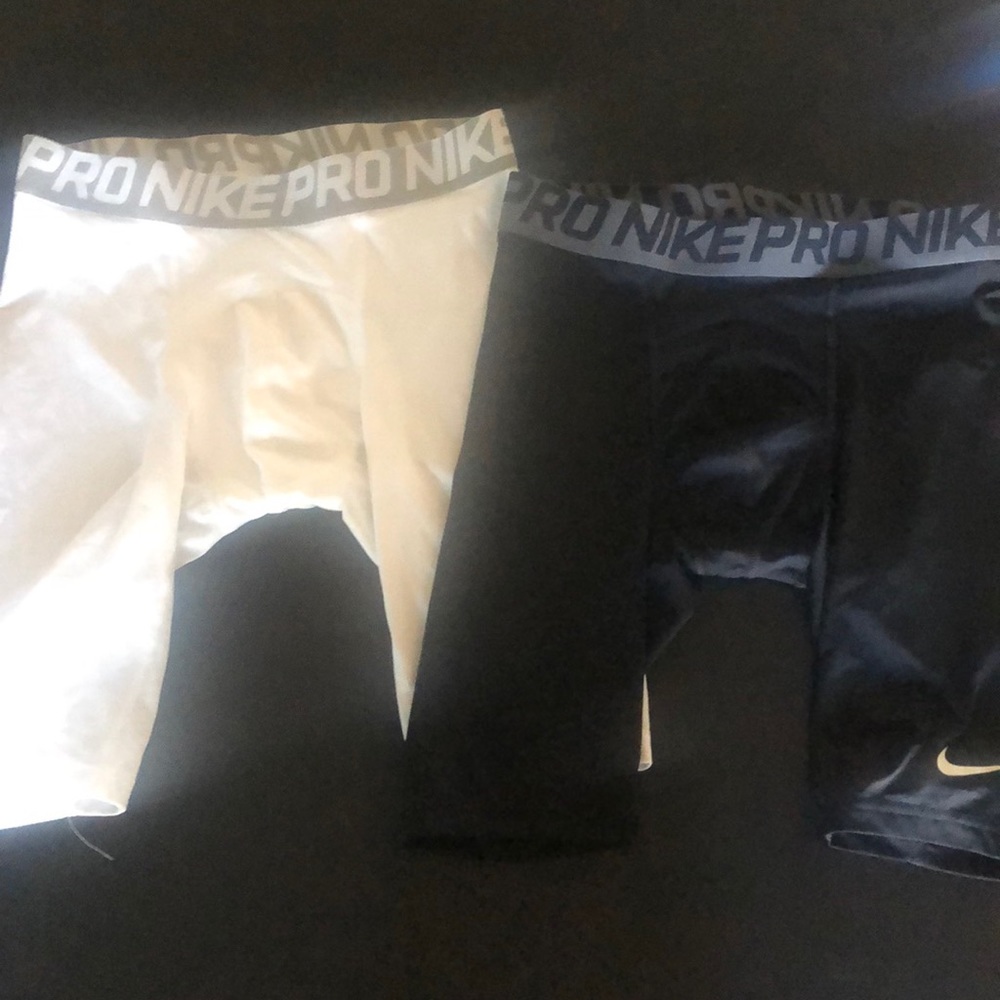 2 pairs long Nike compression shorts